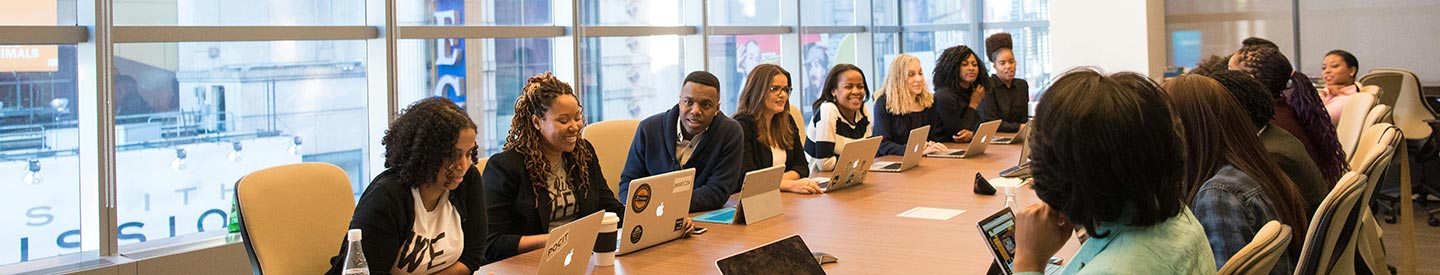 Diverse group meeting in business room